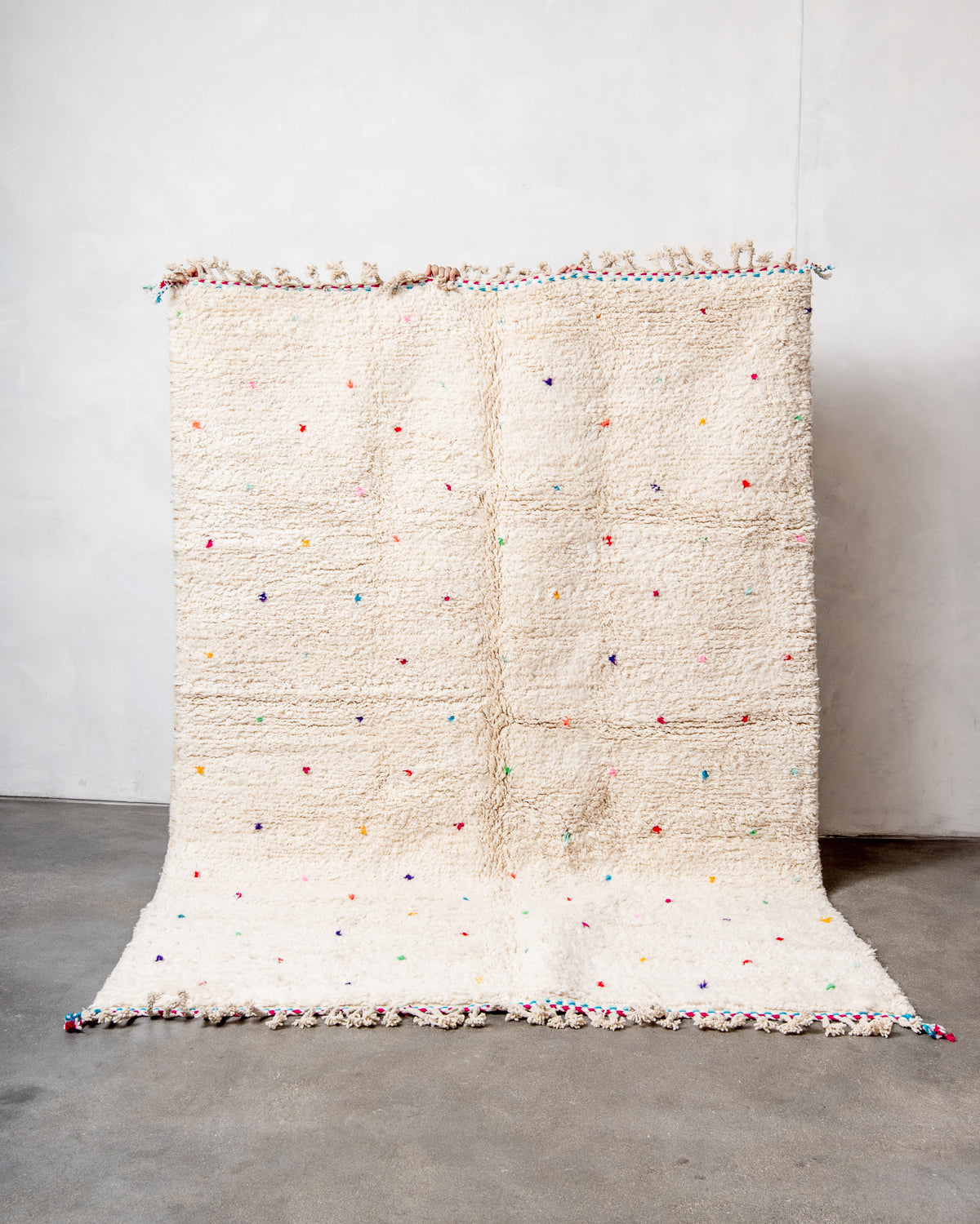 Modern, designer, handcrafted Berber rug from Morocco. Beniourain carpet with beautiful colours and patterns and fluffy wool texture.